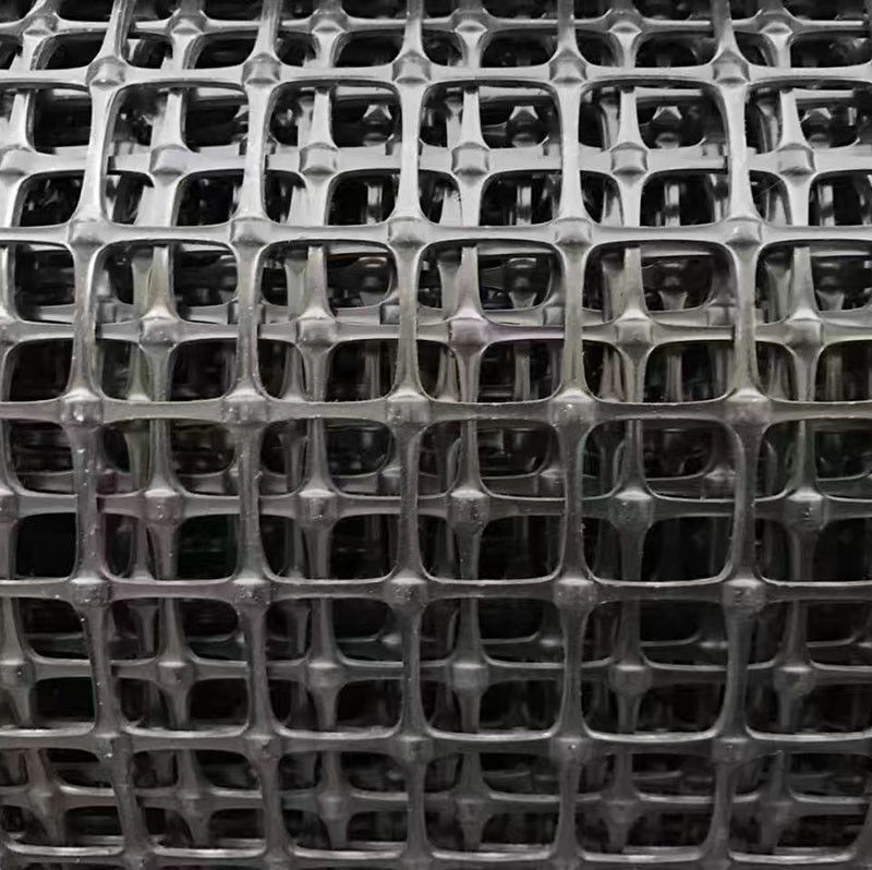 Biaksial-Plastik-Geogrid zur Bodenverstärkung, hohe Zugfestigkeit PP/PET-Geogrid,Balck 30kN/m, Stabilisierungsnetz für die Straßenbasis