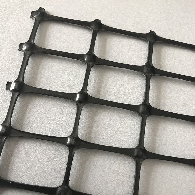 Hohe Zugfestigkeit Biaxial Plastiknetz 30kN/m Schwarzes PP/PET Geogrid zur Bodenverstärkung und Straßenbasisstabilisierung
